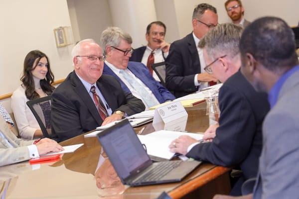 Photo of Oklahoma Broadband Governing Board Jim Meek (center left, with tie) from the Oklahoma Farm Bureau